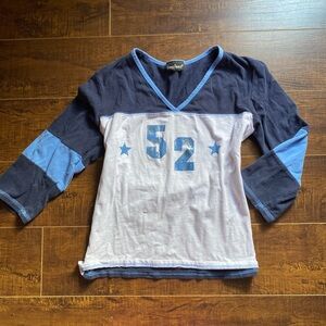 Conspiracy Graphic V-Neck Quarter Sleeve Top
